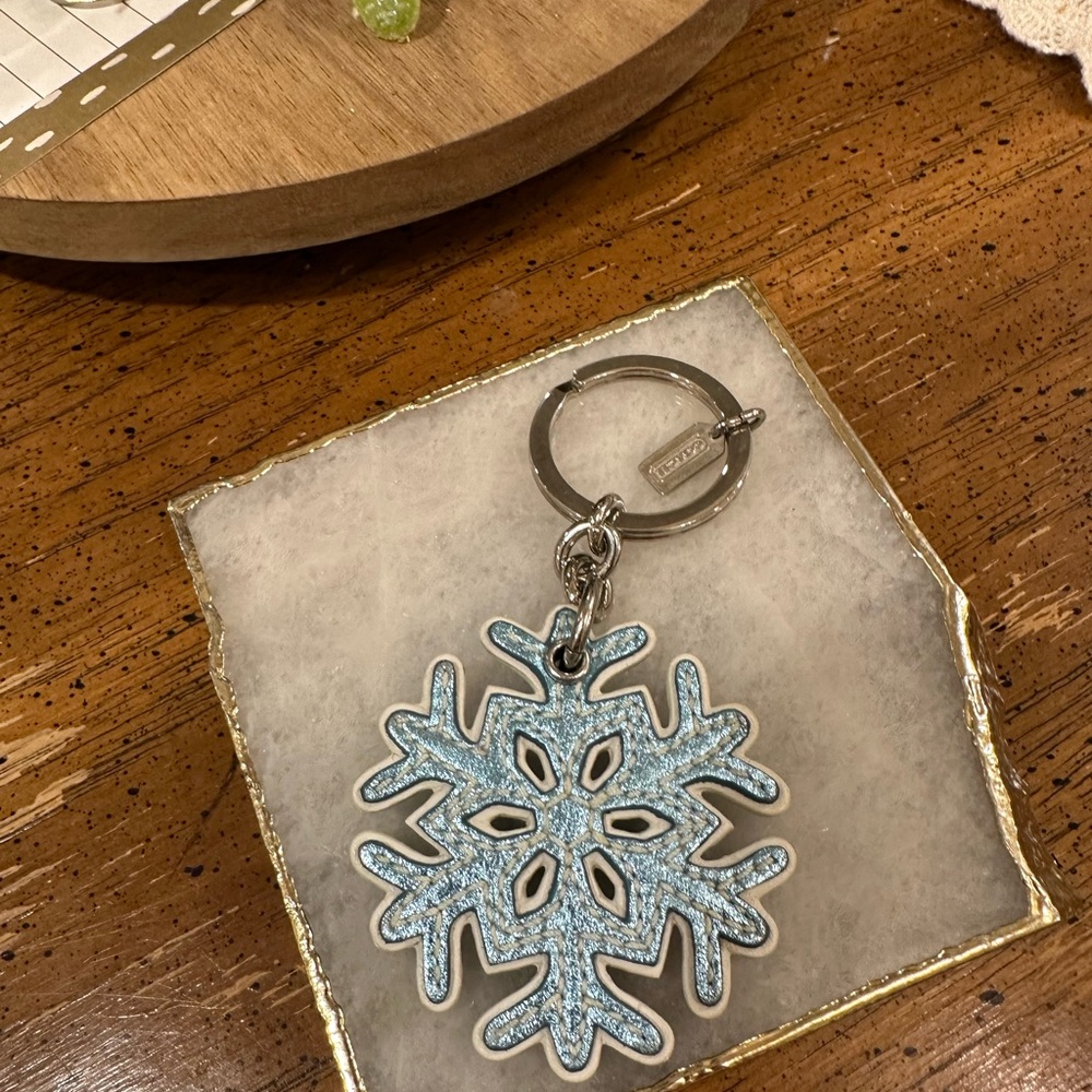 Coach Silver and Blue Snowflake Keychain